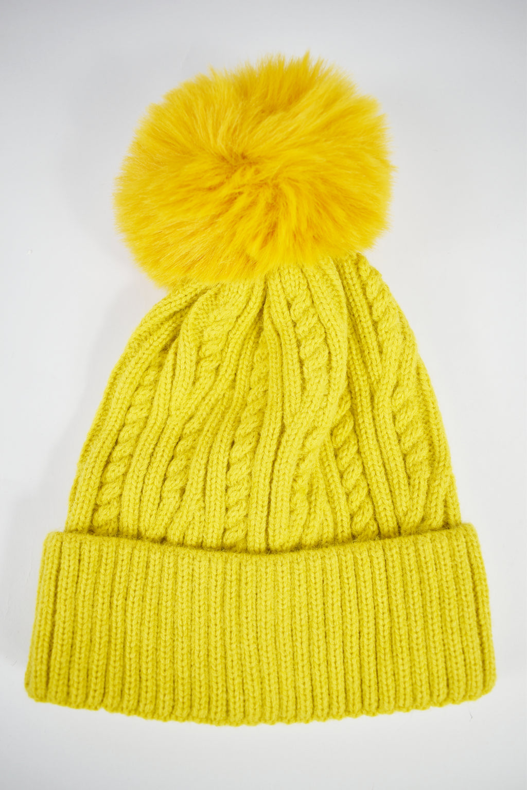 Cappello trecce pompon