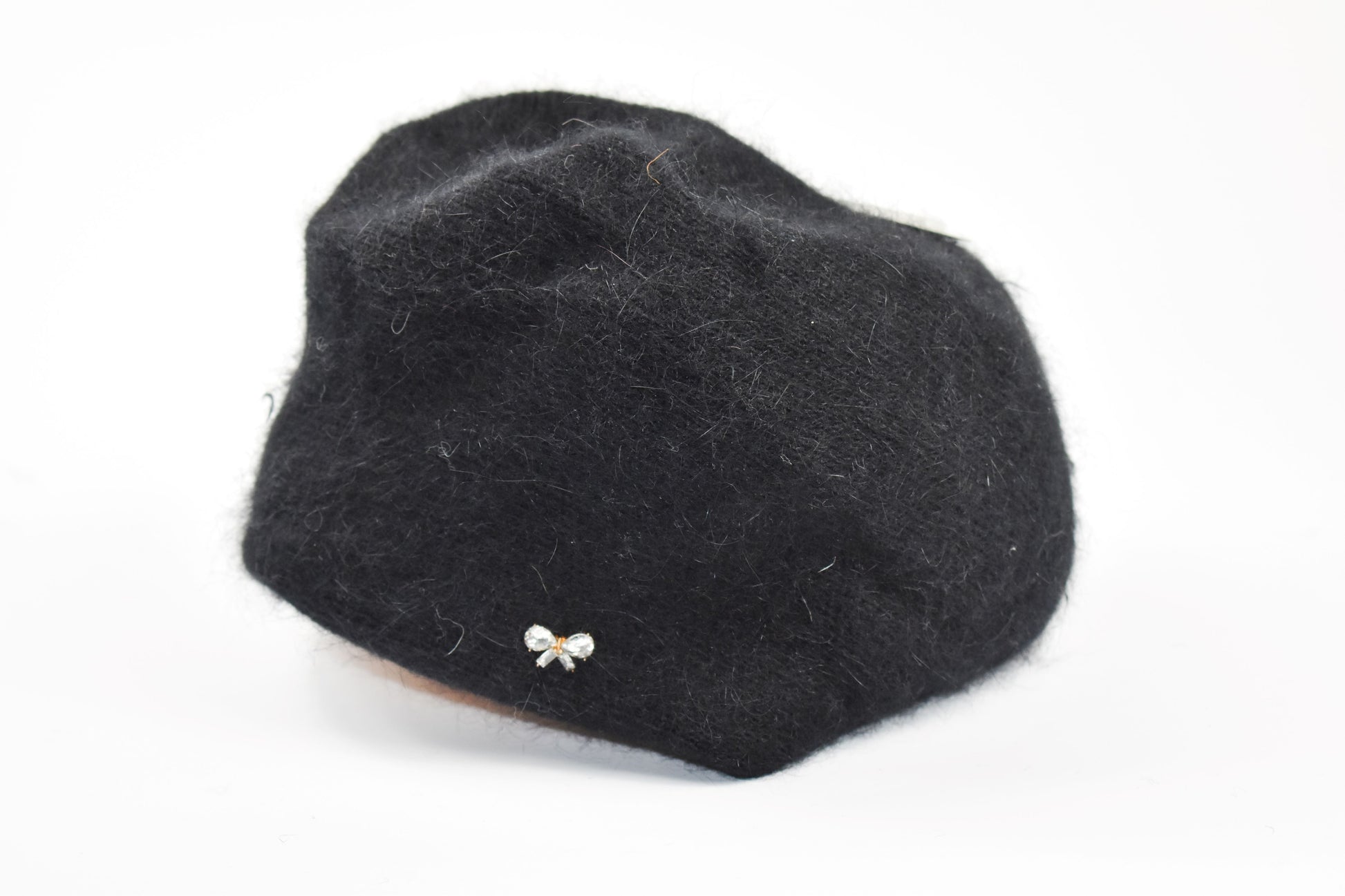 Berretto basco con fiocchetto